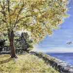 Golden Tree at the Edge of a Tranquil Lake